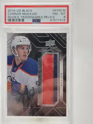 Carte de hockey Connor McDavid #RTRCM 2015 Upper Deck Black Rookie Trademarks Relics, relique de rookie de la marque CartesQC
